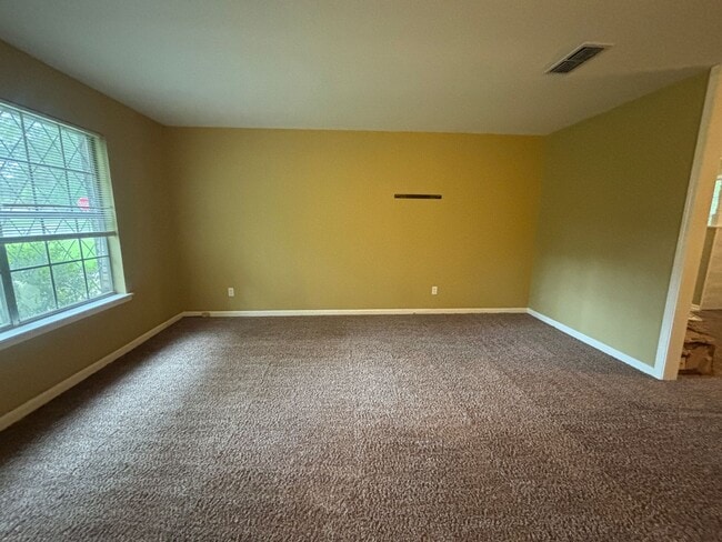 Building Photo - Corner lot in Southern Hills... Lawn included with rent.