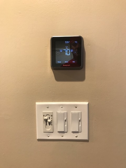 Thermostat in downstairs family room - 512 Carlyle Ln