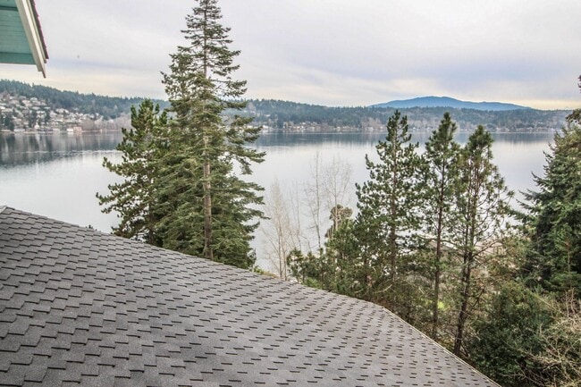 Building Photo - Spacious 4-Bedroom Home with Stunning Lake...