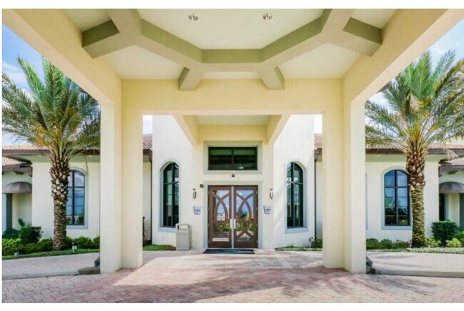 Building Photo - BEAUTIFUL CHAMPIONS GATE 2 BED 2 BATH COND0  w/GARAGE - FULLY FURNISHED - 12 MONTH RENTAL