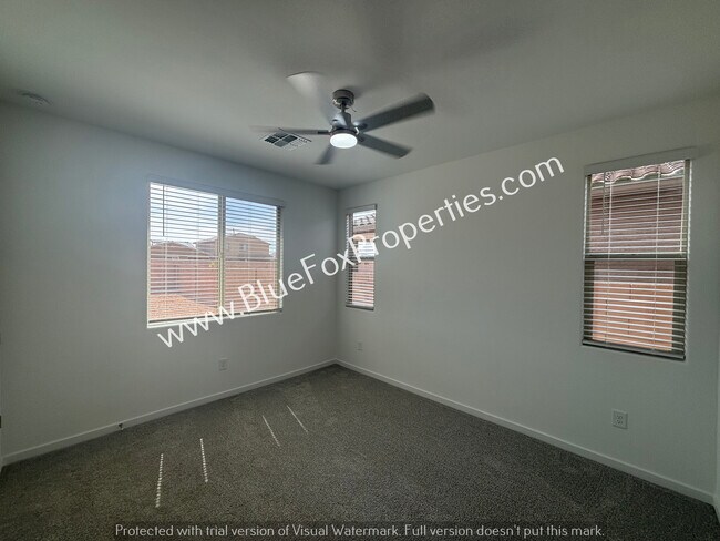 Building Photo - 35049 S Lasso Ln