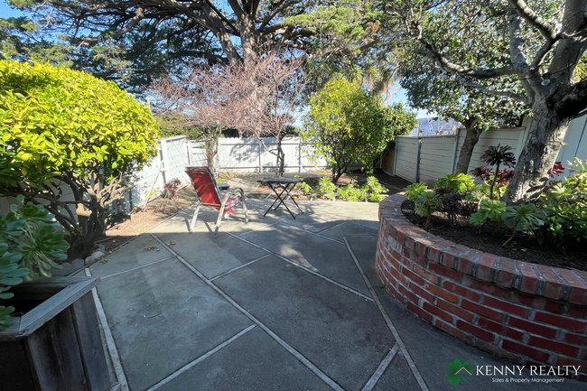 Building Photo - Three Bedroom with Private Yard and Patio