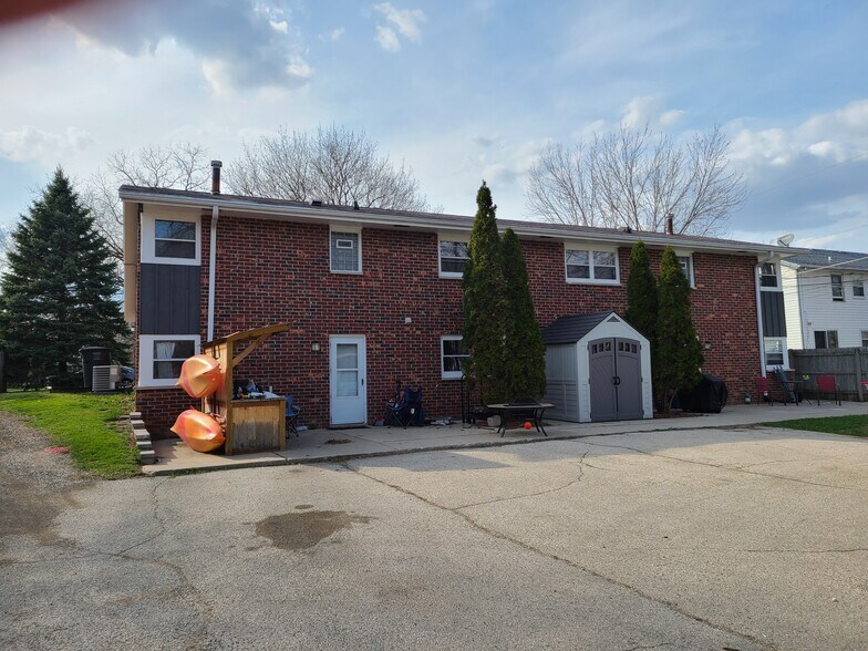 Back entrance of unit with private patio - 217 S Water St