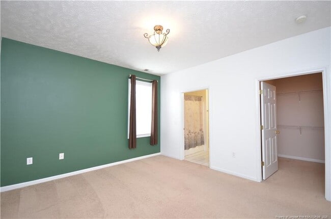 Building Photo - Well maintained 2nd-story condo