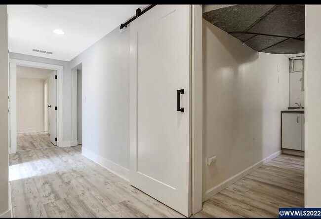 Building Photo - Available Now! 5 bedroom house with large yard and RV parking!