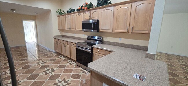 Building Photo - Move-In Ready 2BR/2BA Home with Solar & Bo...