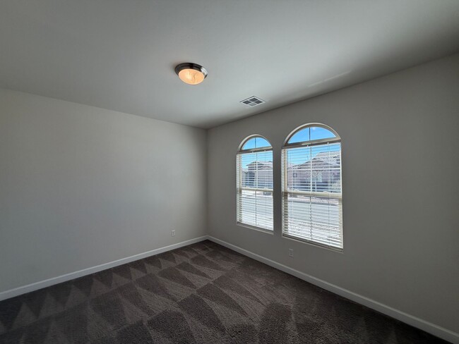 Building Photo - 3 Bedroom Plus Office Single Story New Construction Available Near Woodmont Ave NW & Rainbow Blvd...