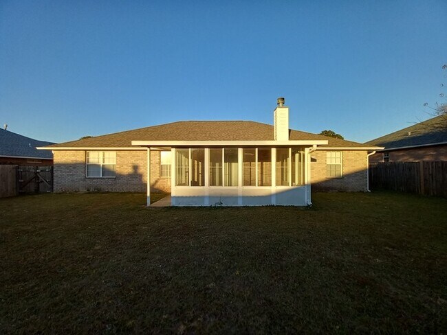 Building Photo - Large 3/2 Family Home that is Conveniently located off Blue Angel PKWY