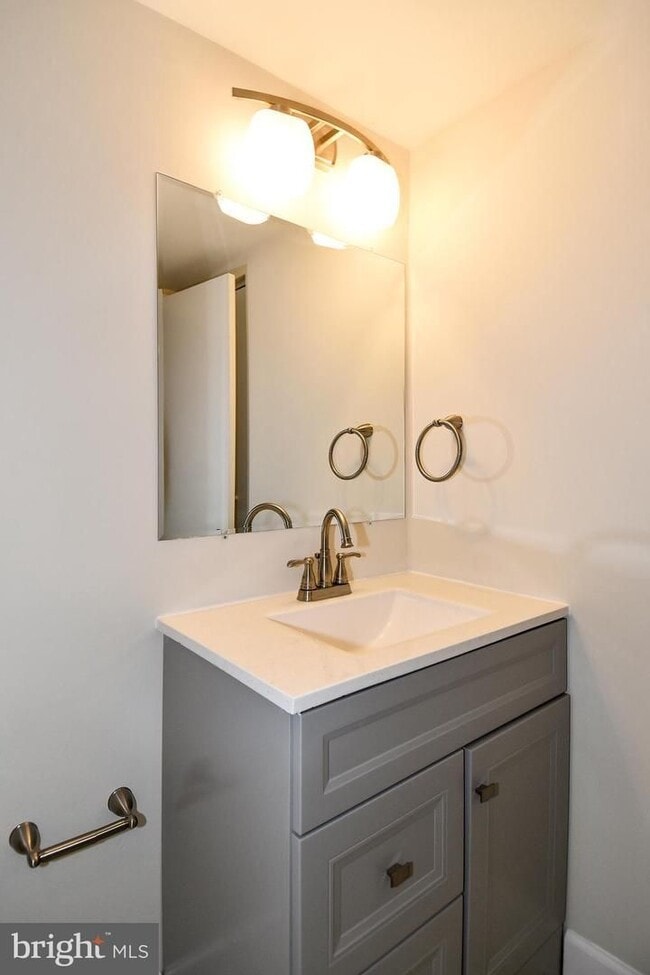 Building Photo - Commuter friendly location has easy access to I495 & Route 50. Metro bus stop in community.