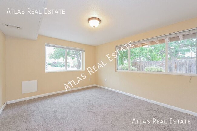 Building Photo - 3 Bedroom 2 Bath with laundry and finished...