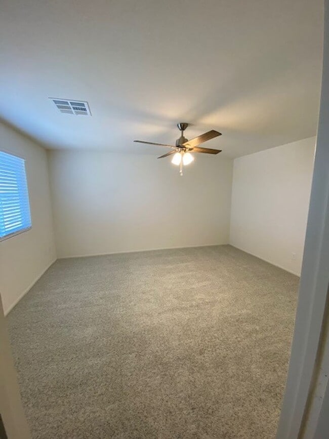 Building Photo - Beautiful Townhome in a Gated Community with 2-Car Garage!!