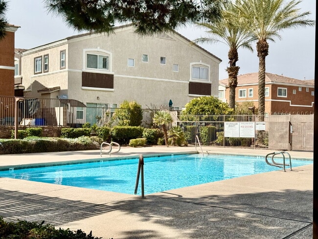 Building Photo - DOWNSTAIRS CONDO | GATED COMMUNITY | CENTENNIAL HILLS | UPDATED 3 BEDROOM