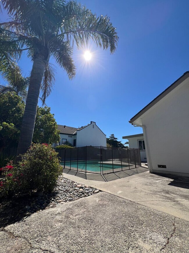 Building Photo - Spacious 4-Bedroom Retreat Just Steps from...