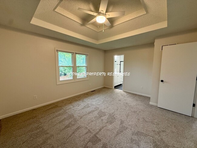 Building Photo - Spacious 3 Bedroom Home with Finished Basement, Covered Deck & Fenced Yard
