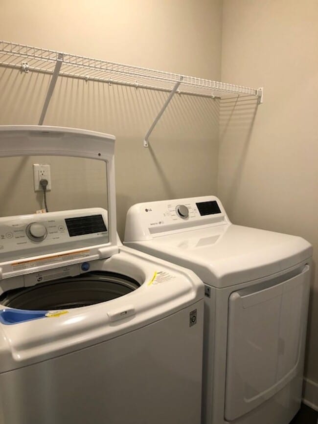 Building Photo - Brand New END UNIT North of Main St  3 mil...