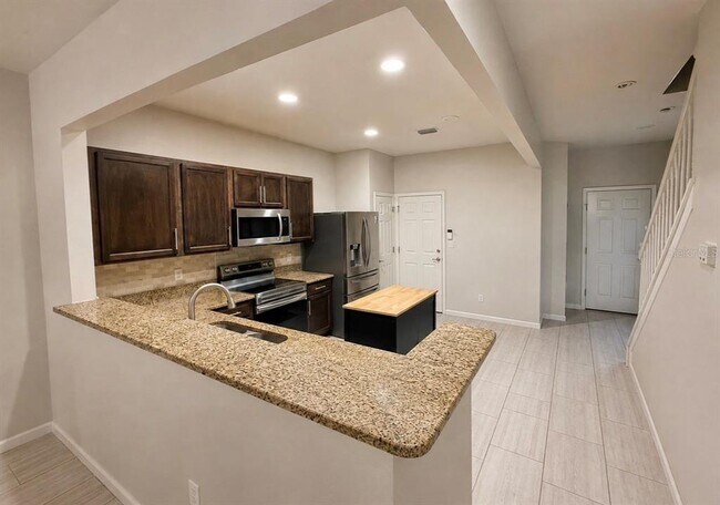Building Photo - 10153 Pink Palmata Ct