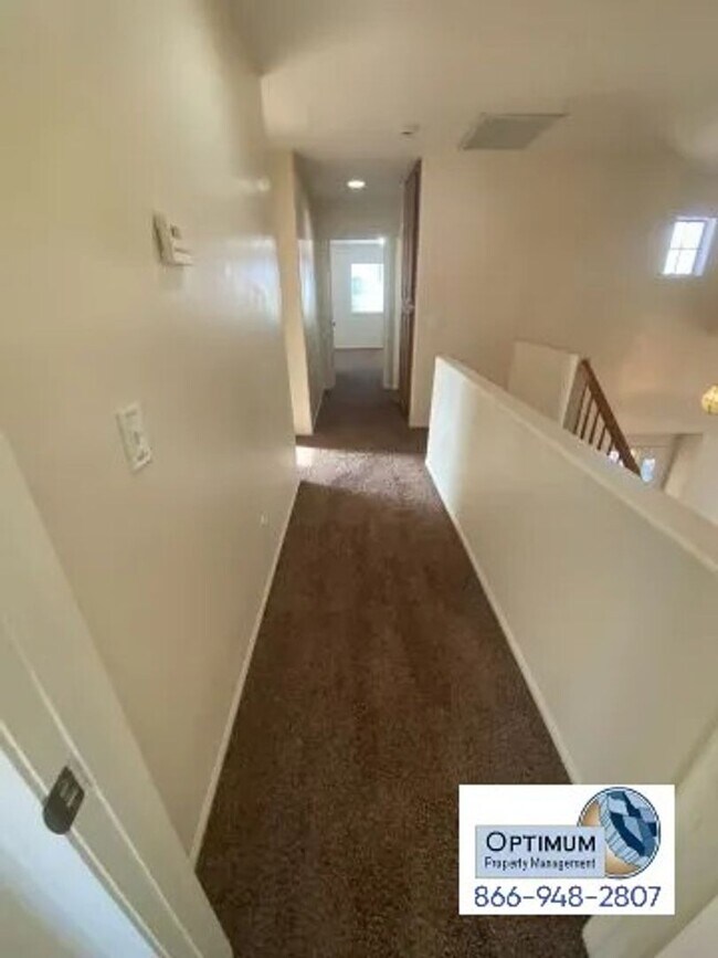 Building Photo - Spacious 4-Bedroom Home with 3-Car Garage & Downstairs Suite!