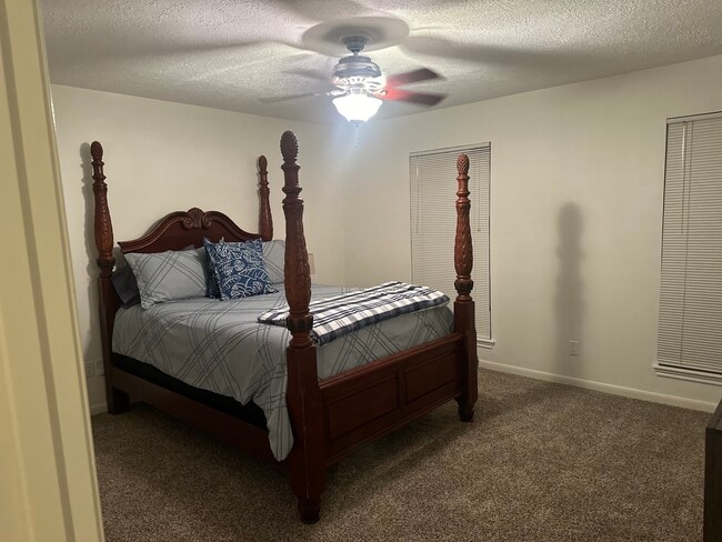 Bedroom 3 with attached restroom. - 4806 Havenwoods Dr
