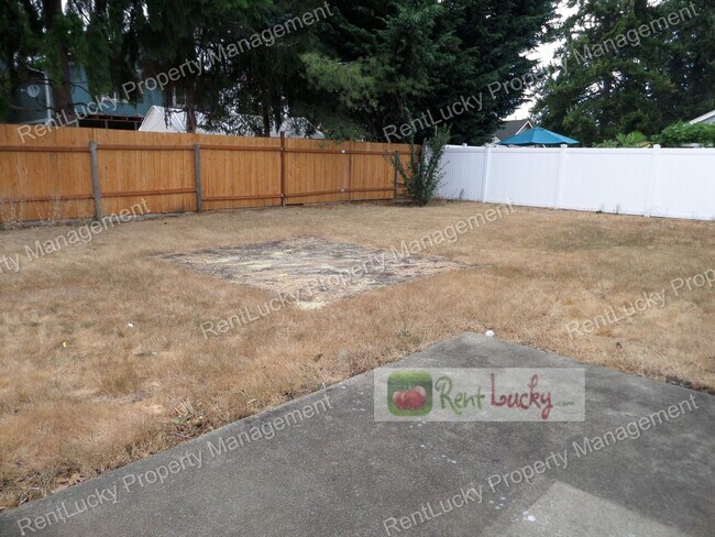 Building Photo - Green-Parkland Duplex