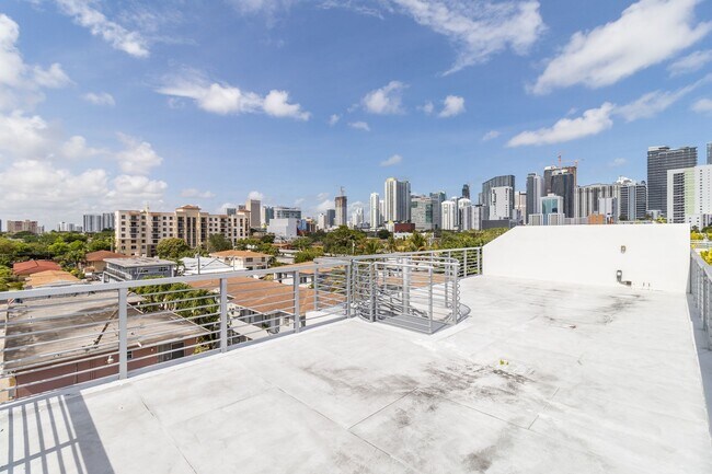 Private Deck - accesible from your living room balcony - 545 SW 11th St