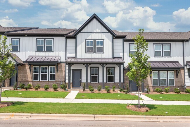 Building Photo - Welcome home to this stunning brand-new townhome in one of Indian Trail's newest and most desirab...