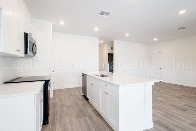 Building Photo - 4 Bedroom/2 Bath Home with Paid Solar in the Southwest - $2545 Per Month!