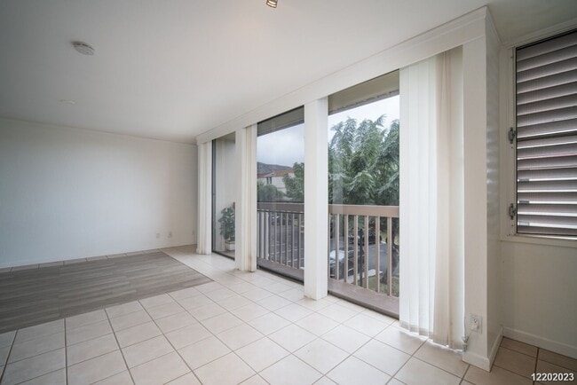 Building Photo - This 2 bedroom, 1 bathroom unit is on the 2nd story in the Makaha Valley Plantation condos. It is...