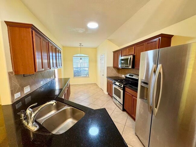 Building Photo - 6418 Black Bamboo Ln