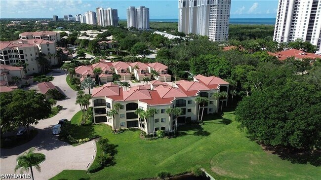 Building Photo - 7048 Pelican Bay Blvd
