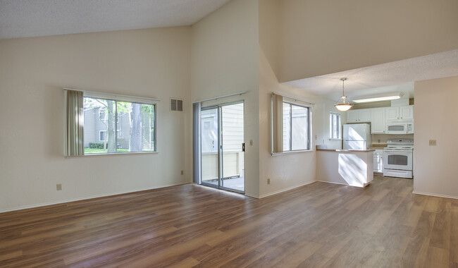 Spacious bedrooms with wood plank flooring - Mariners Cove Apartments