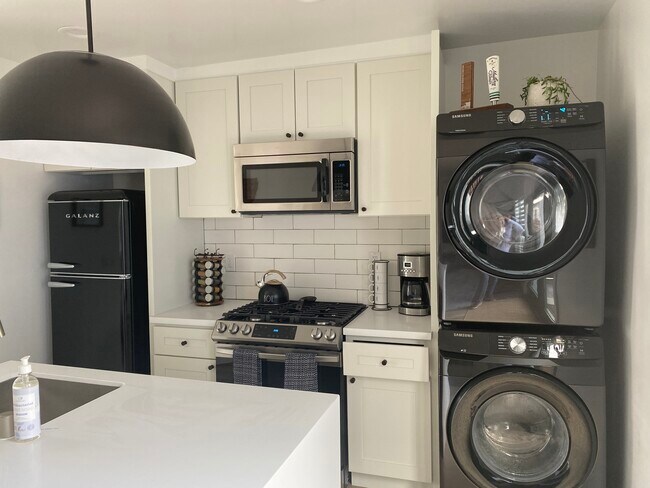 Kitchen with Quartz counters and new appliances - 1457 Loma Ave