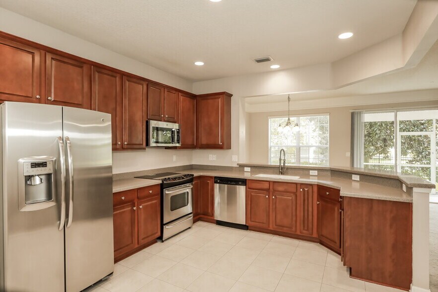 Building Photo - 6499 White Flower Ct