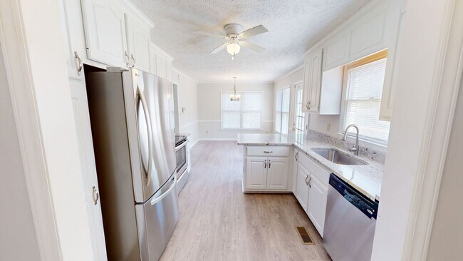 Building Photo - Updated 4 Bedroom w/ Privacy Fence in Jack Britt School District!