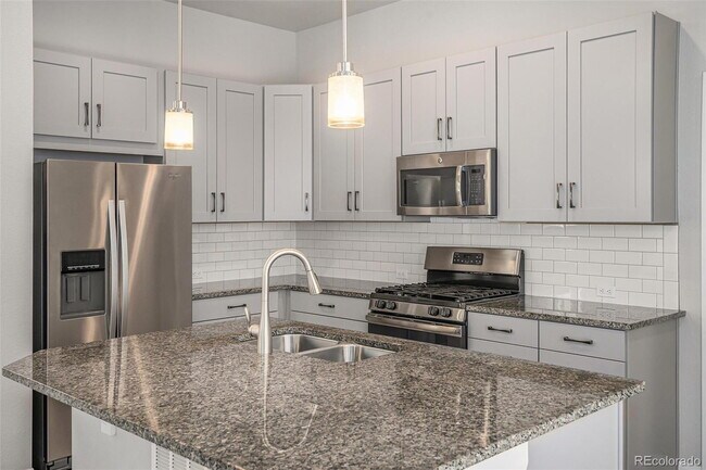 Building Photo - "Spacious 4-Bedroom Sanctuary with 3.5 Bat...