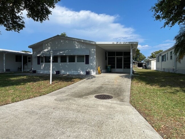 Building Photo - 2 BR 2 BATH Annual Rental in Barefoot Bay Available JUNE 2025