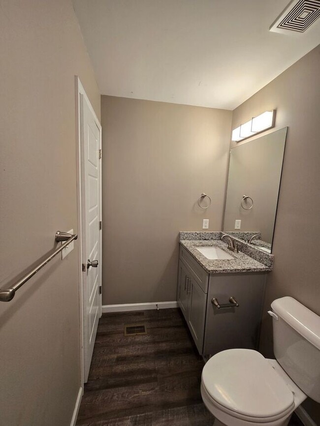 Building Photo - Live Steps from the Highland Strip — Share...