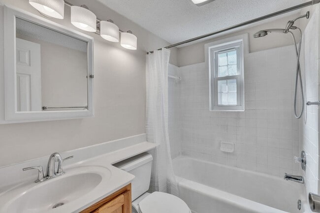 Building Photo - Utilities Included! Updated 2-Bedroom Condo Just Steps from Huntington Metro