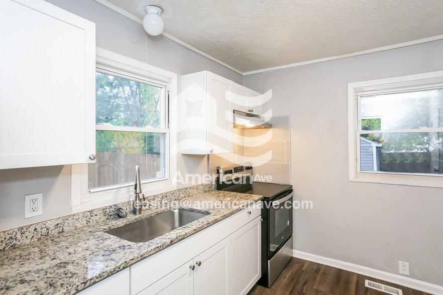 Building Photo - 2036 W Kessler Blvd N Dr