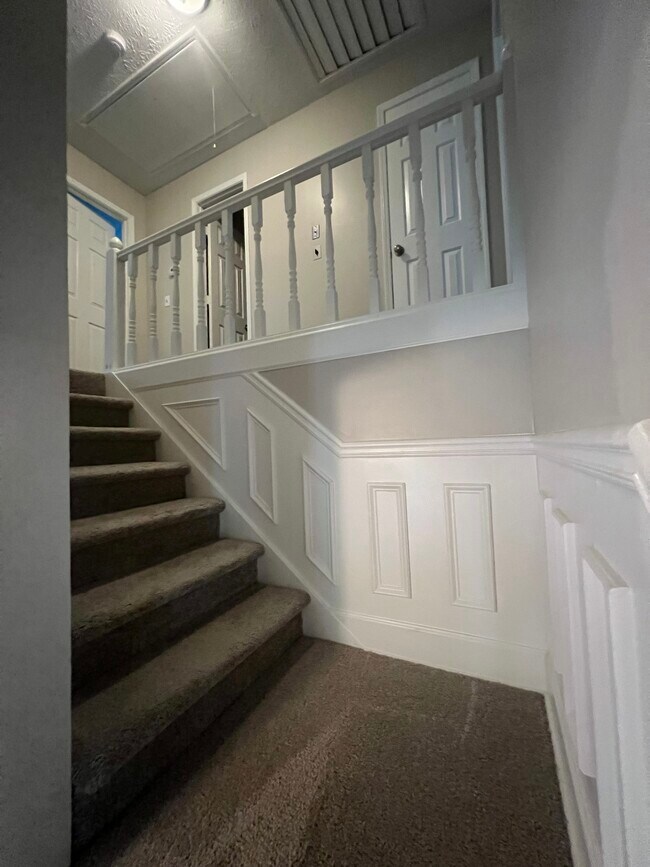 stairs to second floor - 1221 Settlebench Ln NW