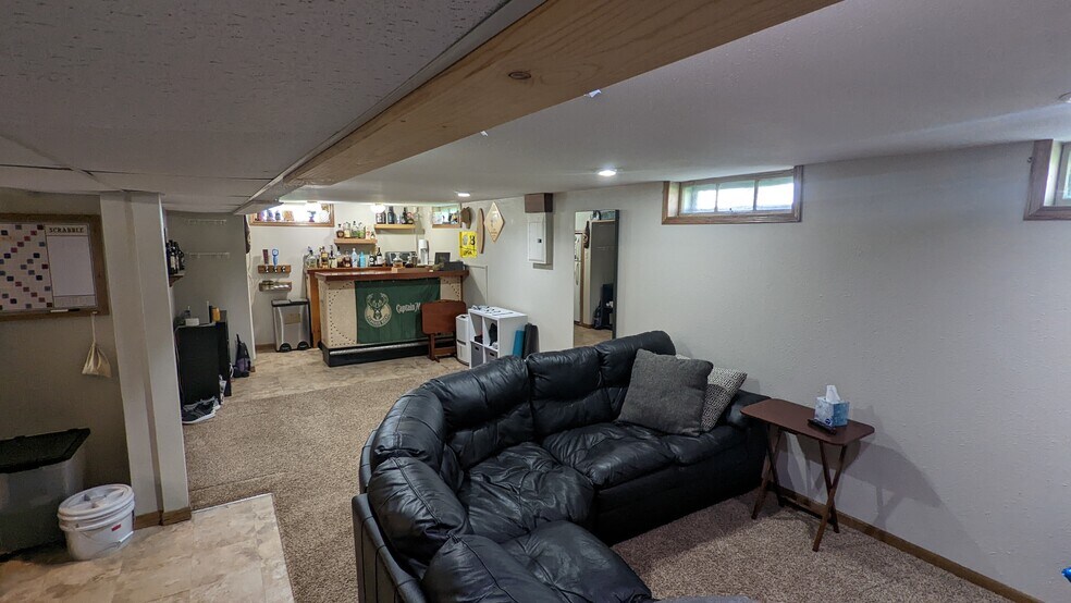 Finished open concept basement - 3579 S Logan Ave