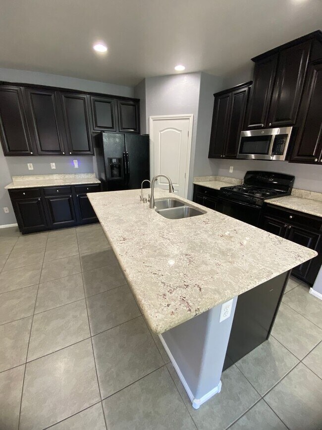 Building Photo - AMERICANA Property Mgmt - Beautiful 4 beds...