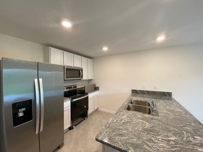 Building Photo - Not Ready for Showings until BEGINNING OF FEBRUARY... Desirable Lake Diamond Subdivision 4/2/2 **...