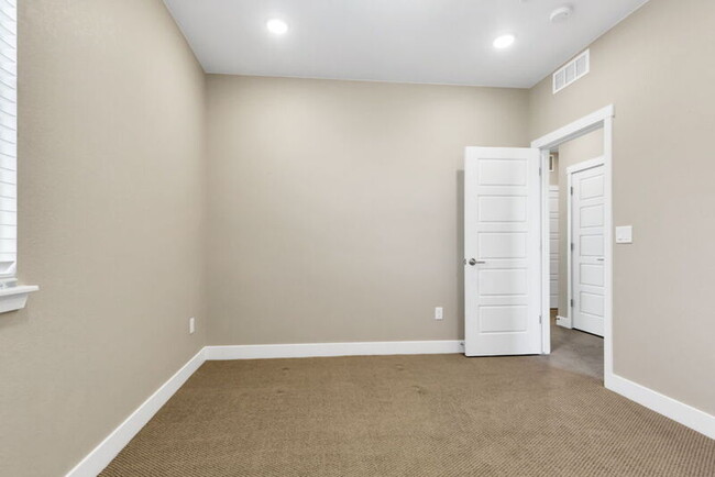 Building Photo - 1555 W 67th Ave