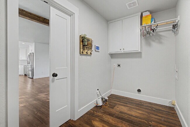 Building Photo - “Farmhouse Charm Meets Modern Luxury on a Serene 5-Acre Lot!”