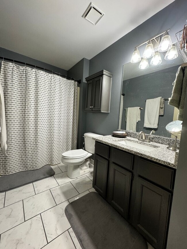 Building Photo - 4 Bedrooms with Finished Basement and Bonus Room!