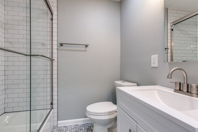 2nd bath room. All brand new! Bath tub, glass sliding doors, beautiful tile! - 8738 Glencrest Ln