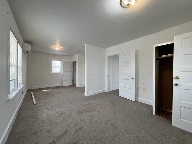 Building Photo - Expansive 4BR 2,900+ Sq Ft Home with Theater-Style Living Room & Bonus Hobby Workshop