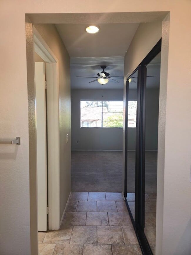 Building Photo - Light-Filled End Unit Condo, 2BD/2.5BA wit...