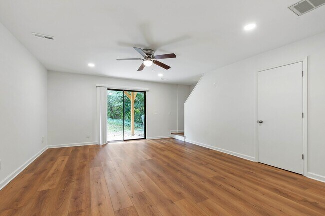 Building Photo - Rare Find: Updated and Modern End-Unit Tow...