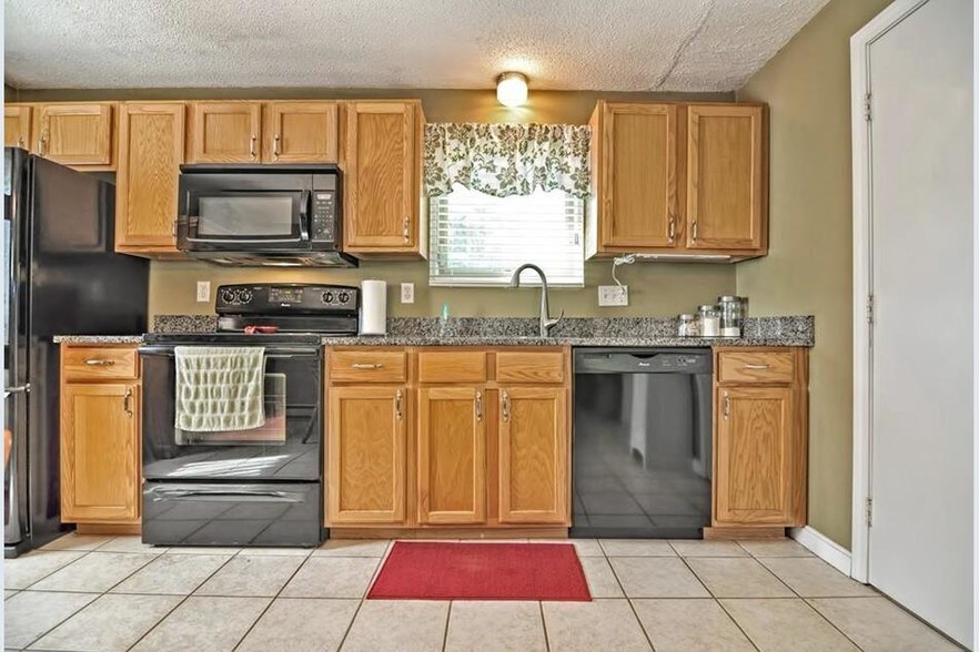 New flooring has been installed - see photos at end of listing - 98 Hayward St